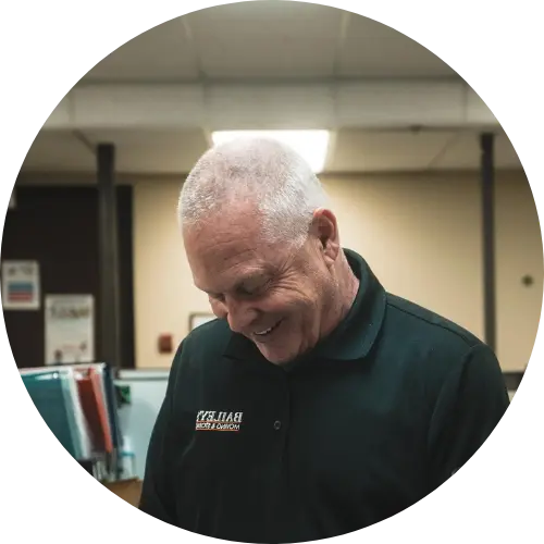Our long-time employee, Norm, signs a written estimate after conducting an in-home estimate