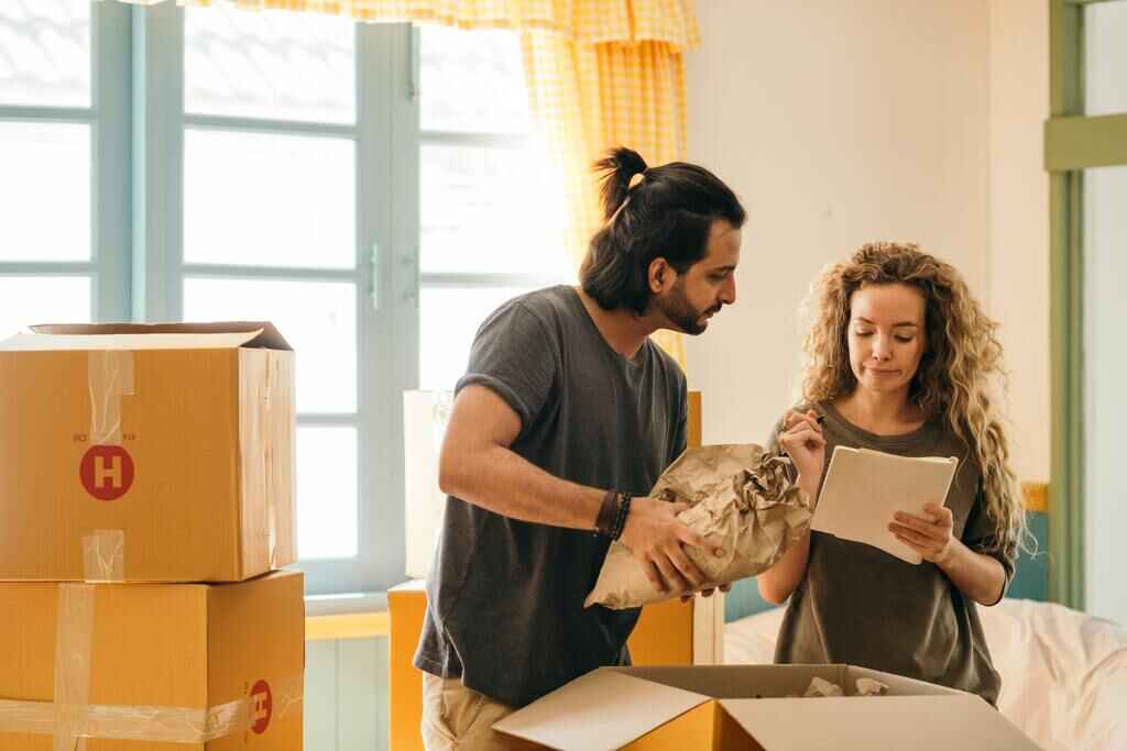 Moving crew demonstrating careful handling of belongings